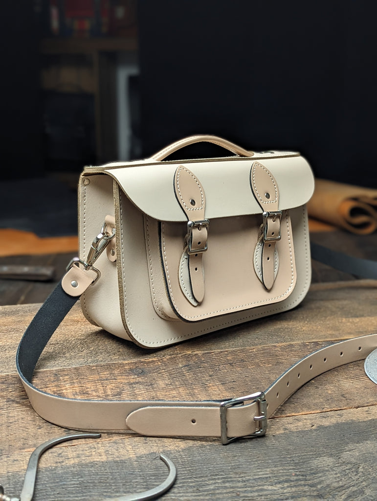 11" Briefcase Satchel in with a Volume Boost, 25mm Shoulder Strap and Full inner Slip Pocket in Cloud Cream and Patent Naked Taupe (MMRP USD$310)