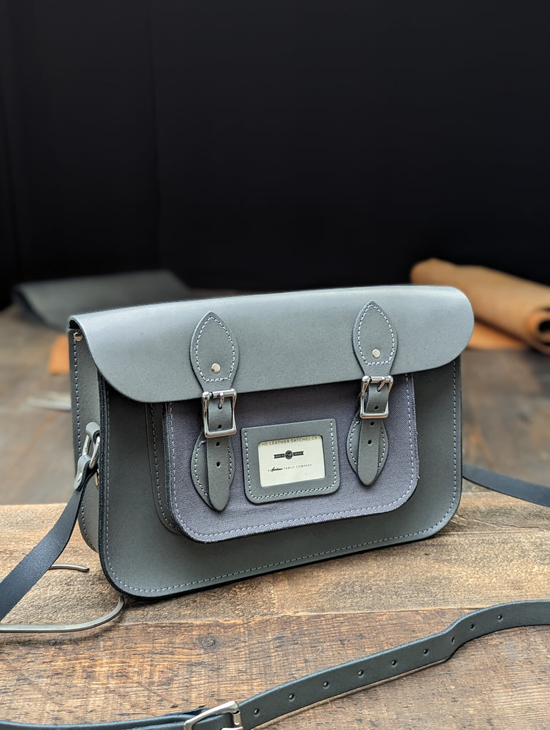 12.5" Classic Satchel made from Greystoke Granite Leather and a Grey Heavy Cotten Fabric Pocket (MMRP USD$240)