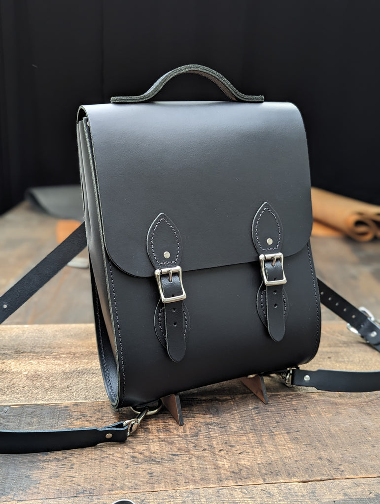 Mini Windsor backpack made with a Bolt-on Handle from Charcoal Black Leather (MMRP USD$260)