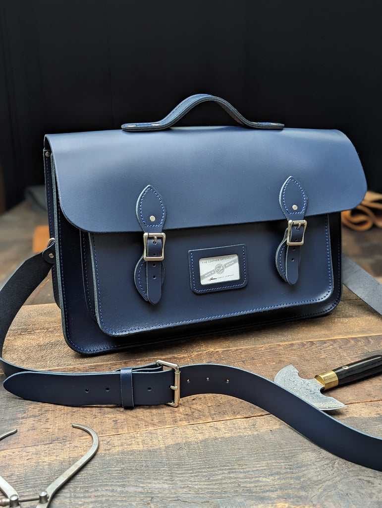16.5" Classic Satchel with Hidden Magnetic Fasteners, a Bolt-on Handle, a 38mm Shoulder Strap and Interchangeable Backpack Straps made form Loch Blue Leather (MMRP USD$405)