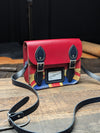Festival Satchel in Pillarbox Red and Loch Blue with a Union Jack printed front panel (MMRP USD$135)