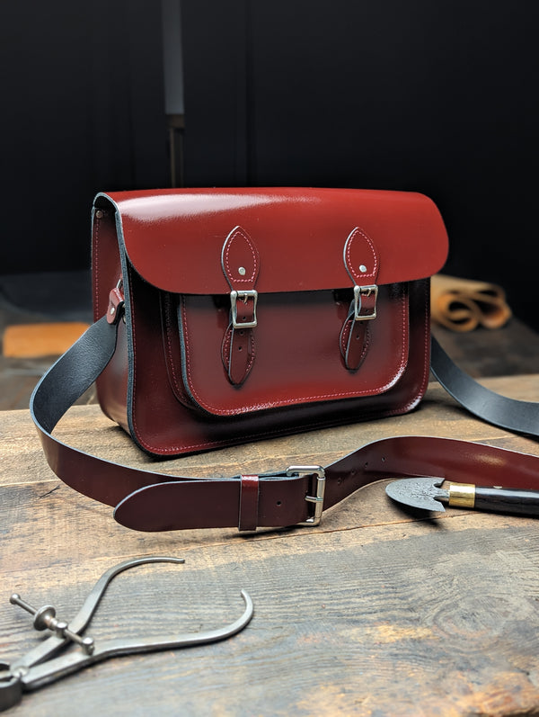 15" Classic Satchel with No Card Window and a 38mm Shoulder Strap in Patent Oxblood Red (MMRP USD$275)